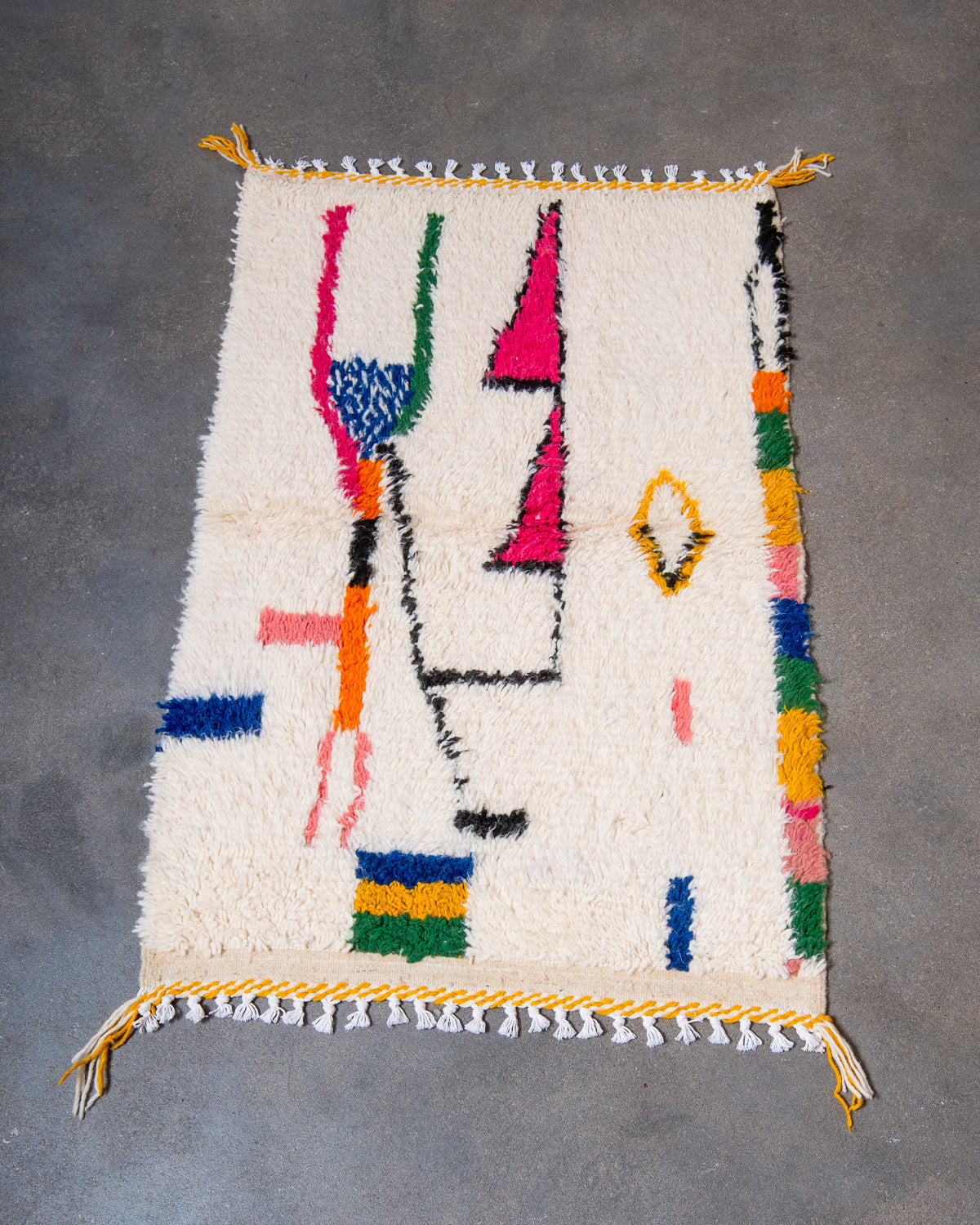 Modern designer handcrafted Berber rug from Morocco. Azilal rug with beautiful colours and patterns. Made of sheep’s wool and colourful cotton.